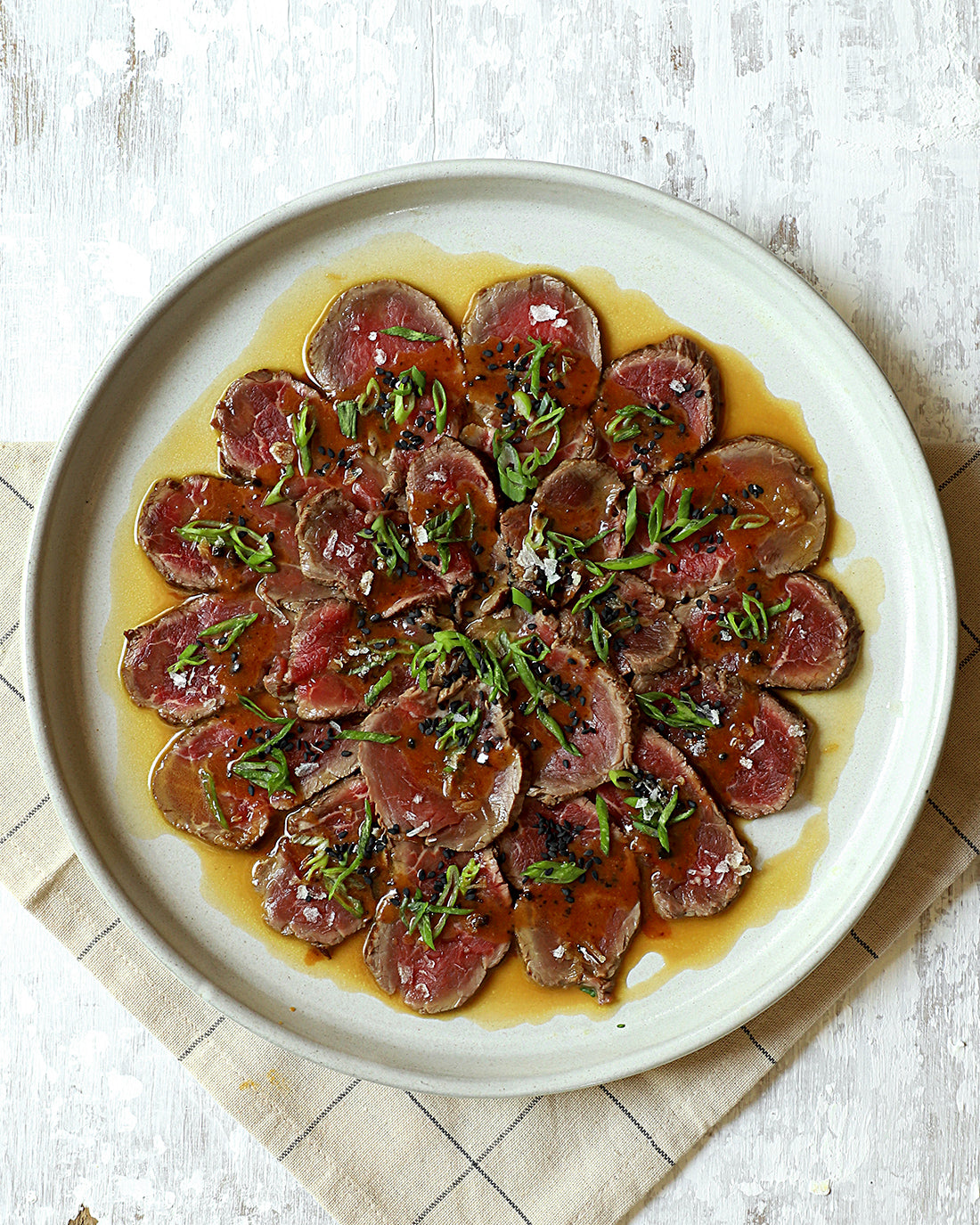 Carpaccio de filete sellado, marinada y Salsa Toffee Trufado