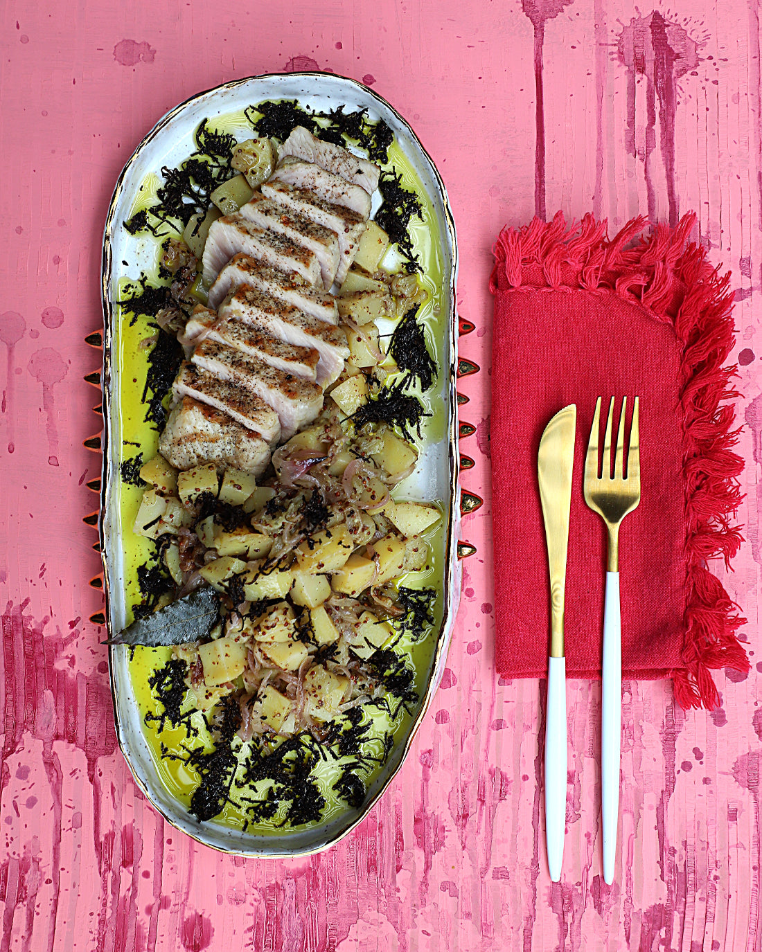 Lomito de cerdo, trufa y papitas confitadas con manzana y mostaza