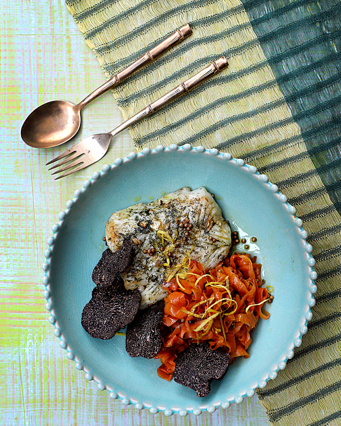 Merluza austral con zanahorias al vodka, trufa y limón