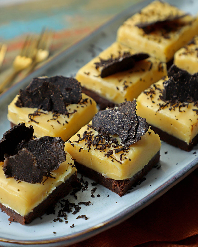 Calugosa de chocolate blanco aromatizado y Trufa Negra